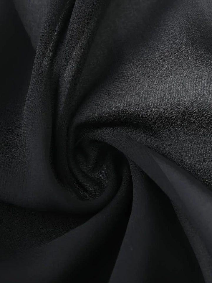 Trendy women's sheer blouse featuring a tie-front and stylish 3/4 sleeves for spring fashion.