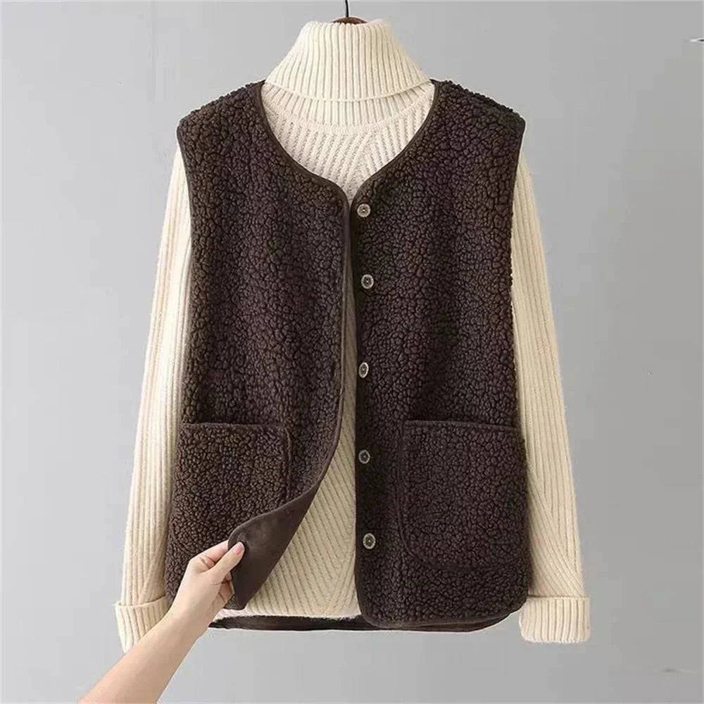 Elegant women's cozy vest, button-front with v-neck & pockets, ideal for winter style.