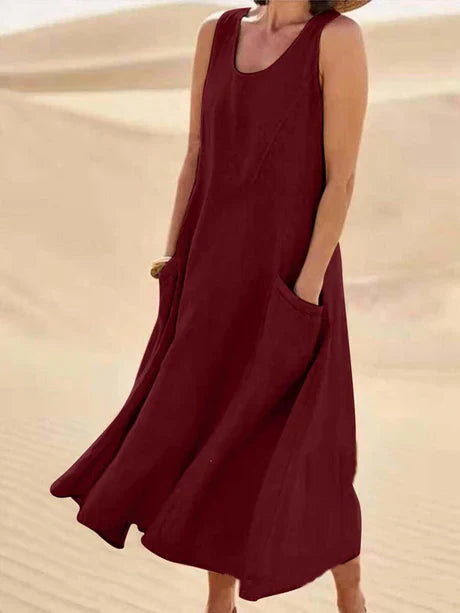 Women's sleeveless cotton linen midi dress, summer style, lightweight, relaxed fit with pockets, perfect for casual days.