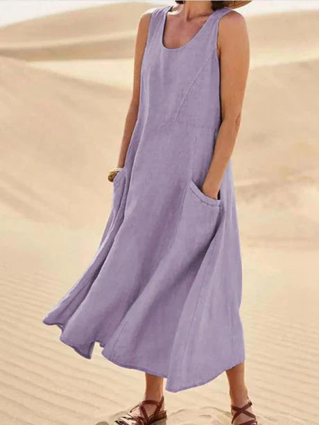 Women's sleeveless cotton linen midi dress, summer style, lightweight, relaxed fit with pockets, perfect for casual days.