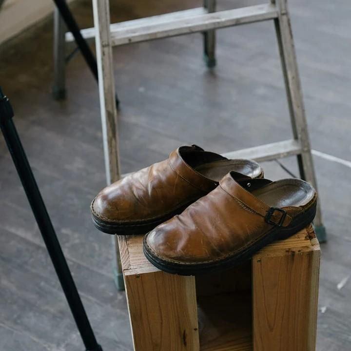 "Women's Slip-On Leather Mules, side view; minimalist design, luxury leather finish, comfortable fit for style and ease."