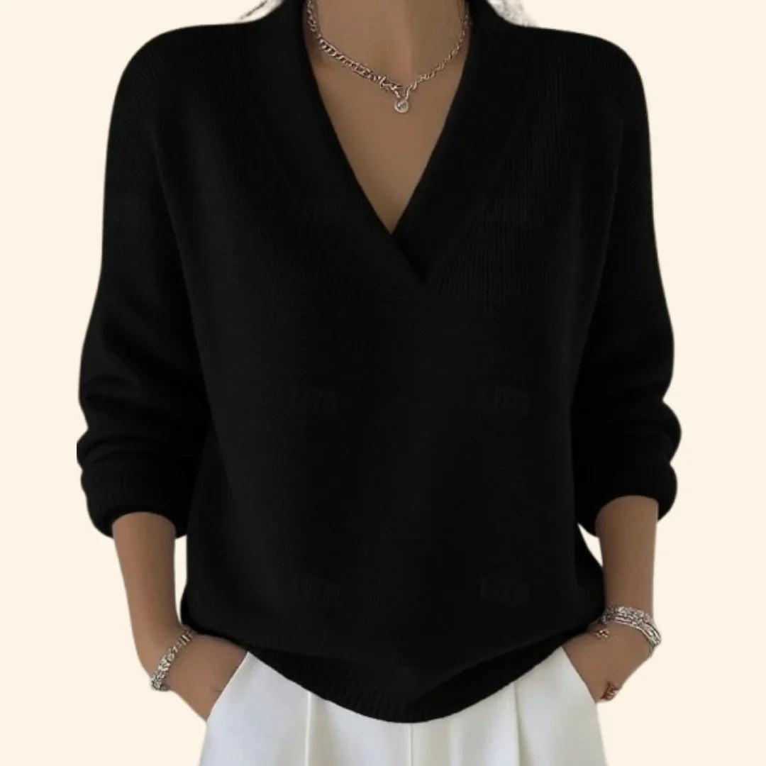 Soft women's relaxed V-neck blouse with long sleeves, a comfortable and stylish top for versatile wear.
