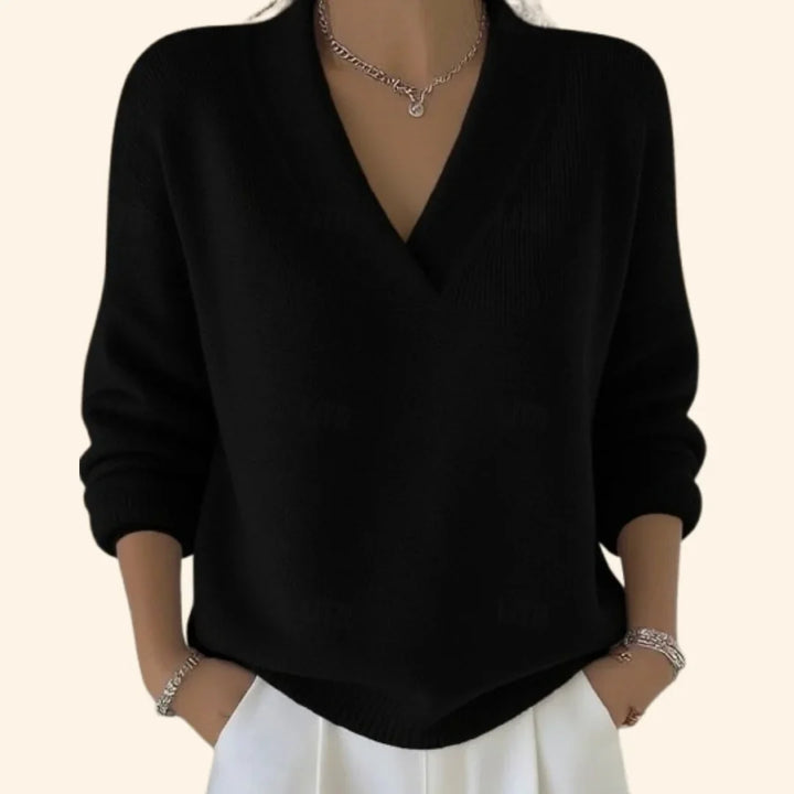 Soft women's relaxed V-neck blouse with long sleeves, a comfortable and stylish top for versatile wear.