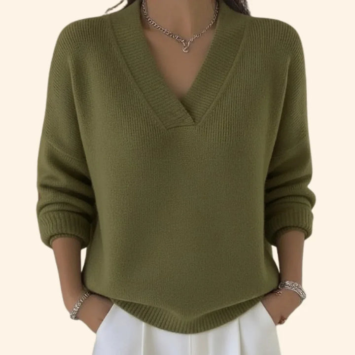 Elegant women's long sleeve V-neck blouse, relaxed fit, ideal comfortable top for casual or office styles.