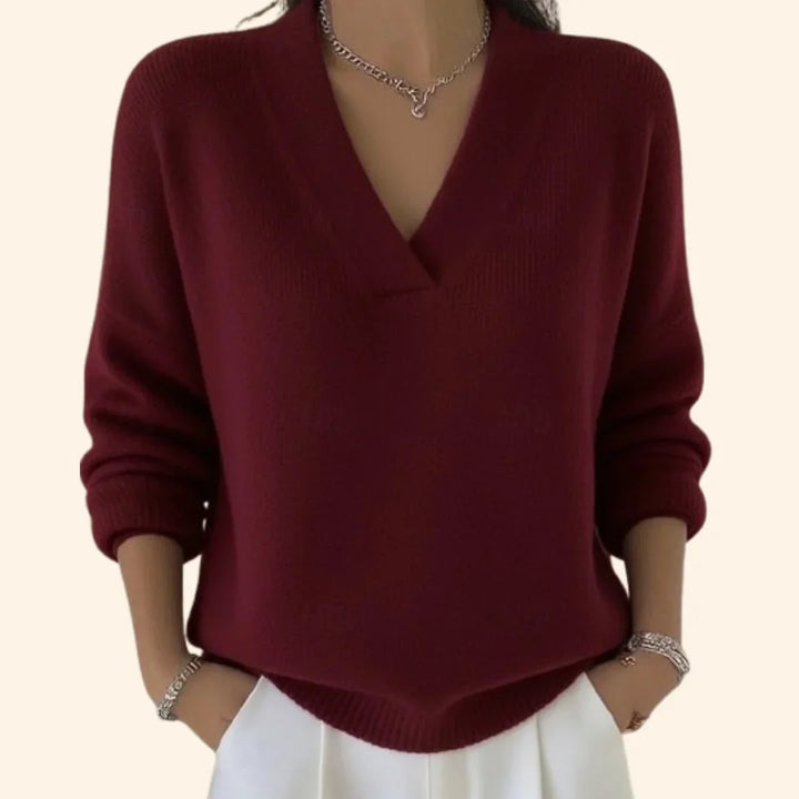 Women's relaxed fit V-neck long sleeve blouse, elegant & comfortable for work or casual chic.