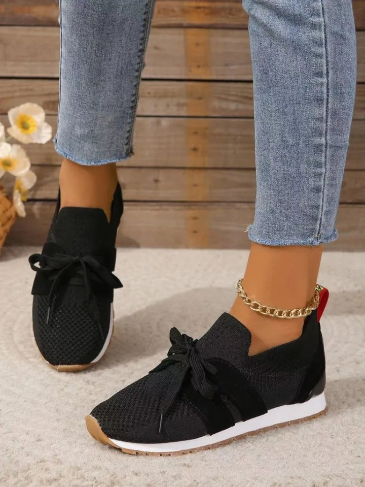 Women's sporty sneakers with breathable mesh, sleek design, non-slip sole, available in multiple colors and sizes 35-42.