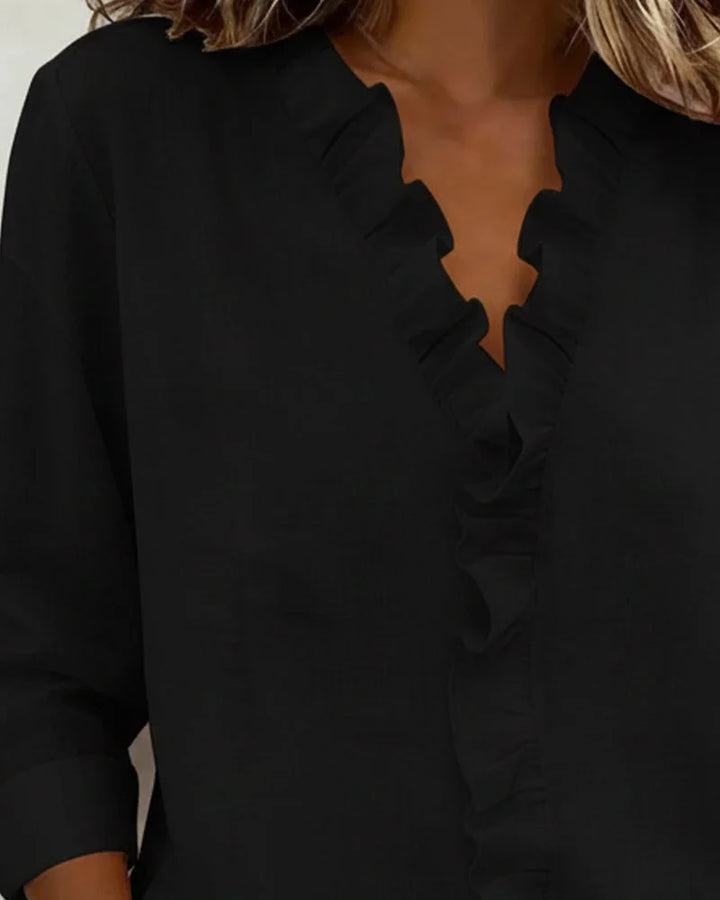 Women's elegant long-sleeve blouse: ruffle V-neck, relaxed fit. Perfect for spring fashion, casual chic & office.