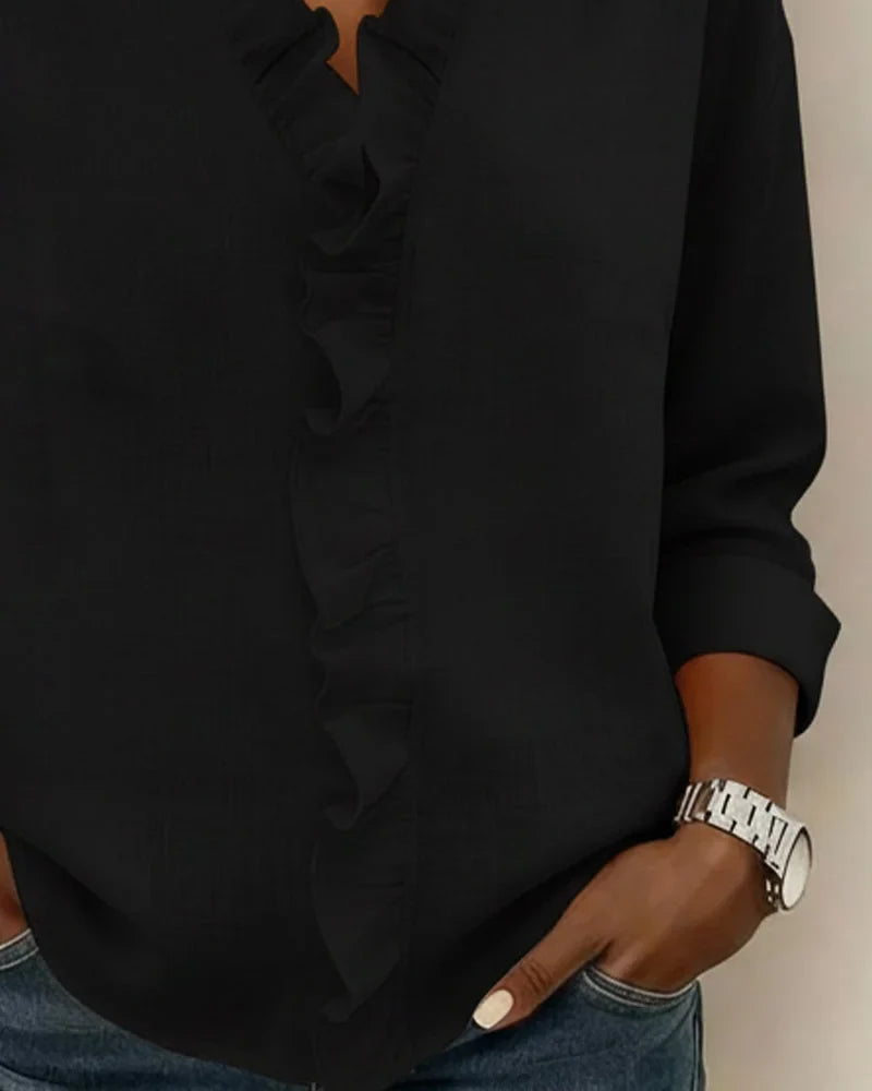 Spring fashion women's blouse with elegant ruffle V-neck & long sleeves. Relaxed fit top for casual or office wear.
