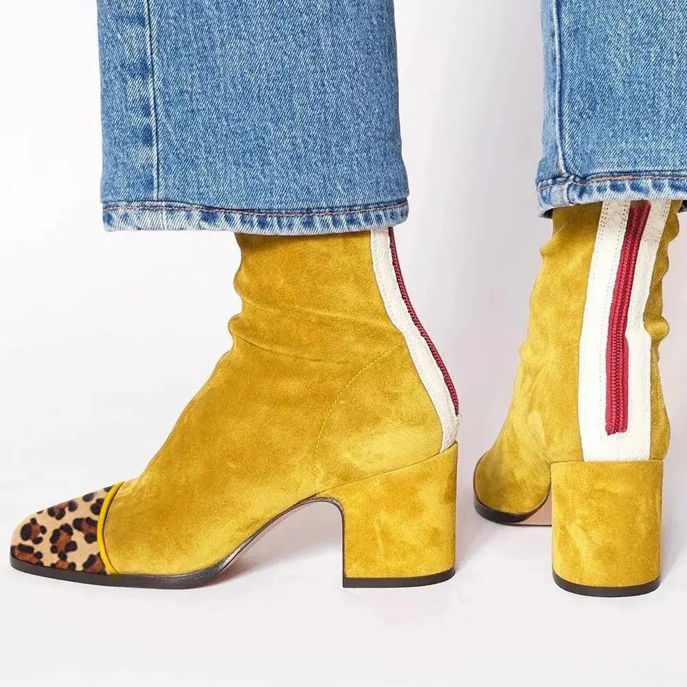 Stylish women's square toe ankle boots with a comfortable block heel. Perfect for autumn & winter fashion.