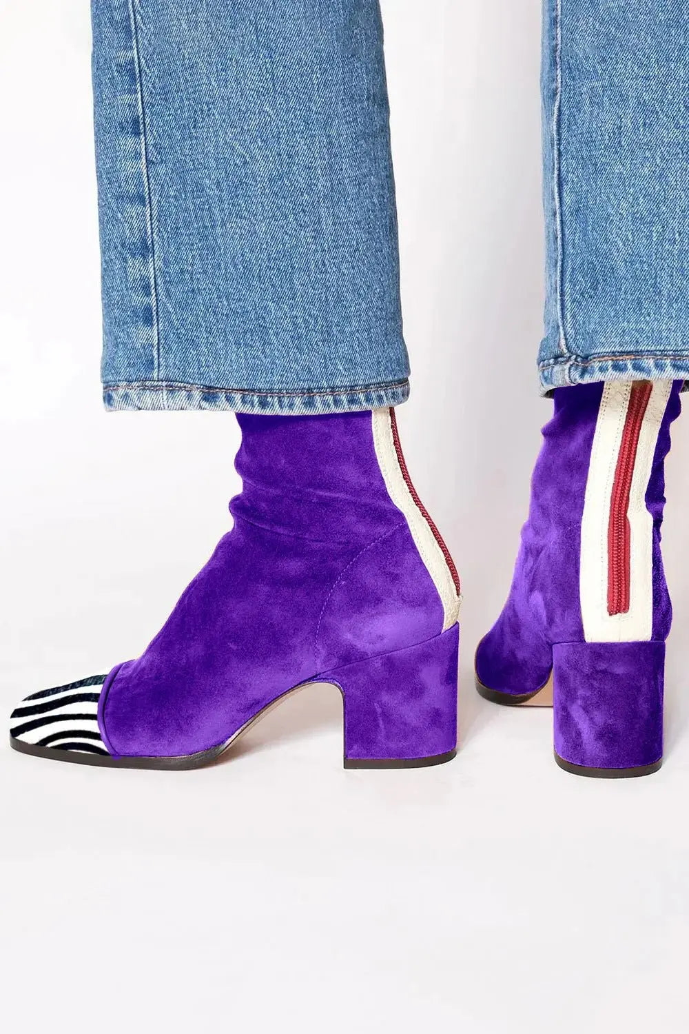 Chic women's square toe block heel ankle boots. Versatile and modern everyday footwear for autumn.