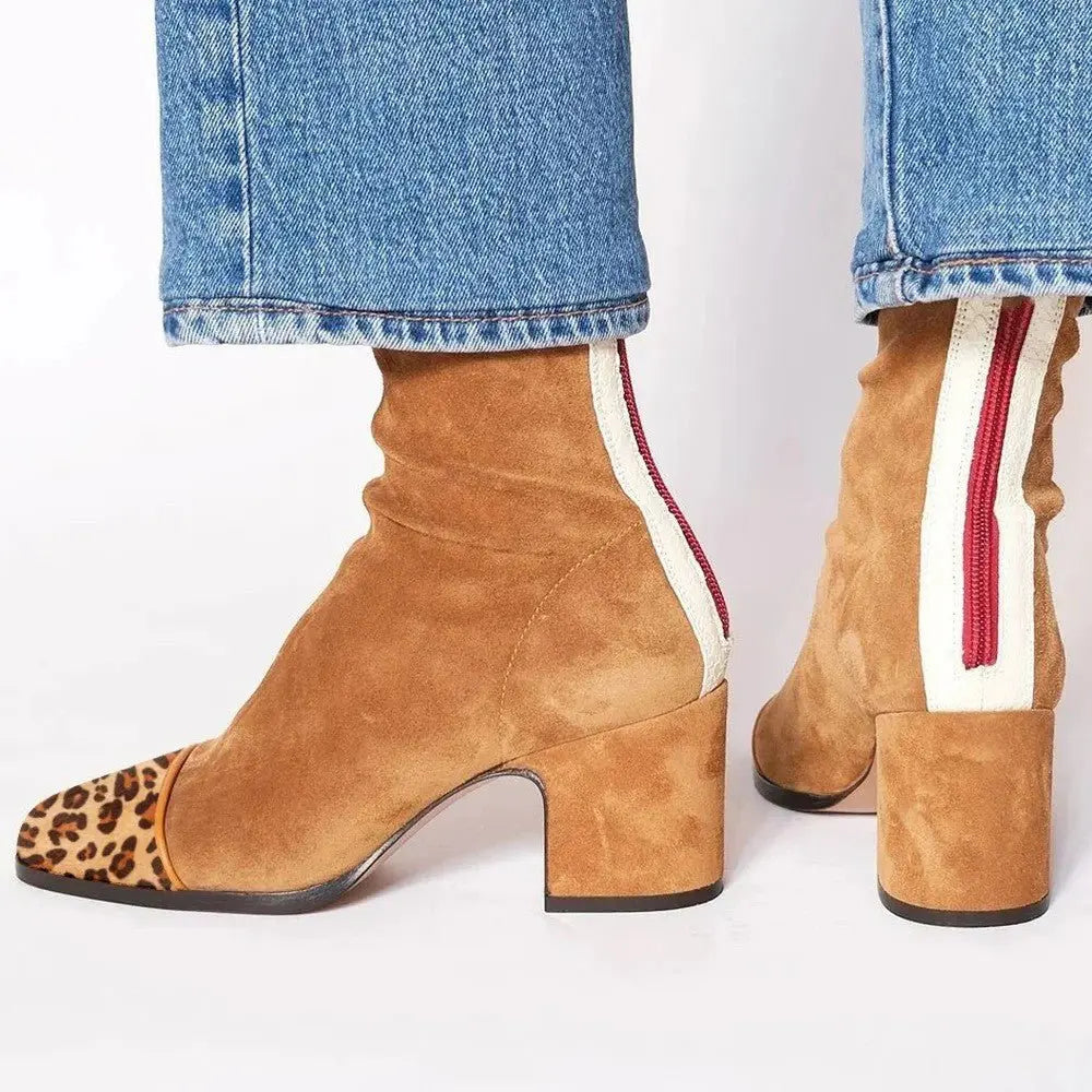 Women's chic square toe block heel ankle boots. Modern design for comfortable and stylish autumn looks.