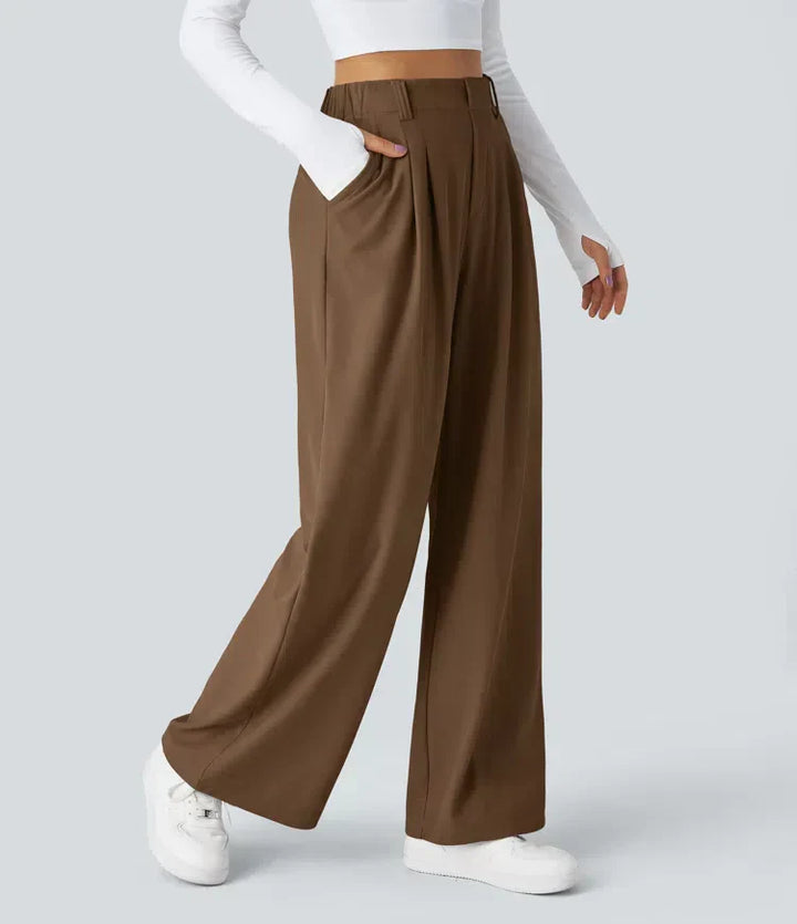 Women's stretch trousers, black, smooth fabric, tailored fit, flexible style, ideal for casual to formal outfits.