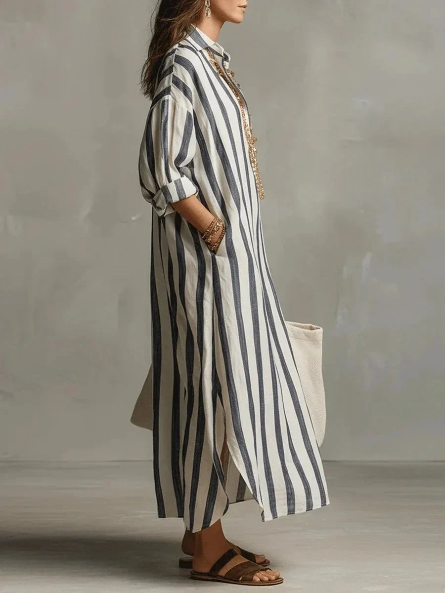 Elegant women's striped maxi dress with collared neckline & roll-tab sleeves, ideal for spring/summer.