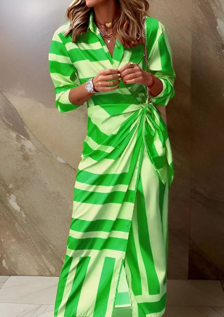 Elegant day-to-night striped wrap midi dress with long sleeves, paired with heels for occasions.
