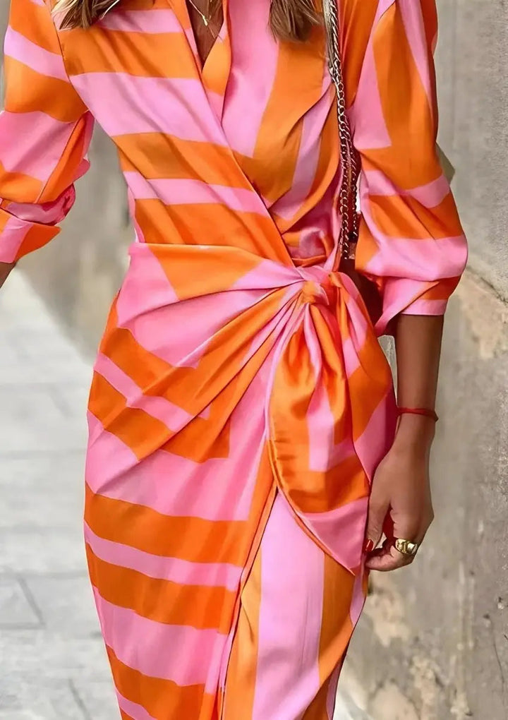 Chic women's long sleeve striped midi wrap dress; comfortable side profile, great for autumn.