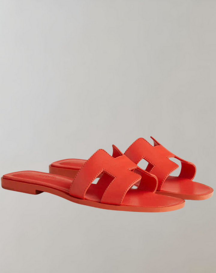 "Women's summer slippers, lightweight ergonomic design, breathable materials, durable anti-slip sole, casual style footwear."