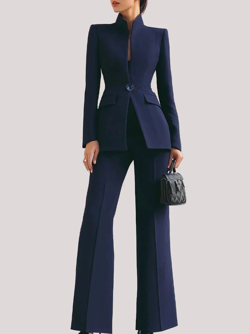 Elegant women's tailored longline jacket & flared trousers set, ideal for professional wear & office outfits.