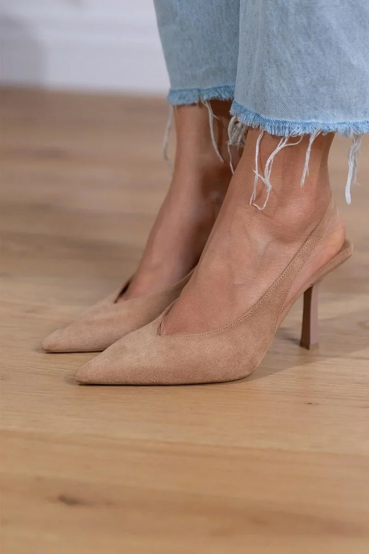 Stylish tan pointed-toe slingback stiletto pumps for women, suitable for formal, evening, and office events.