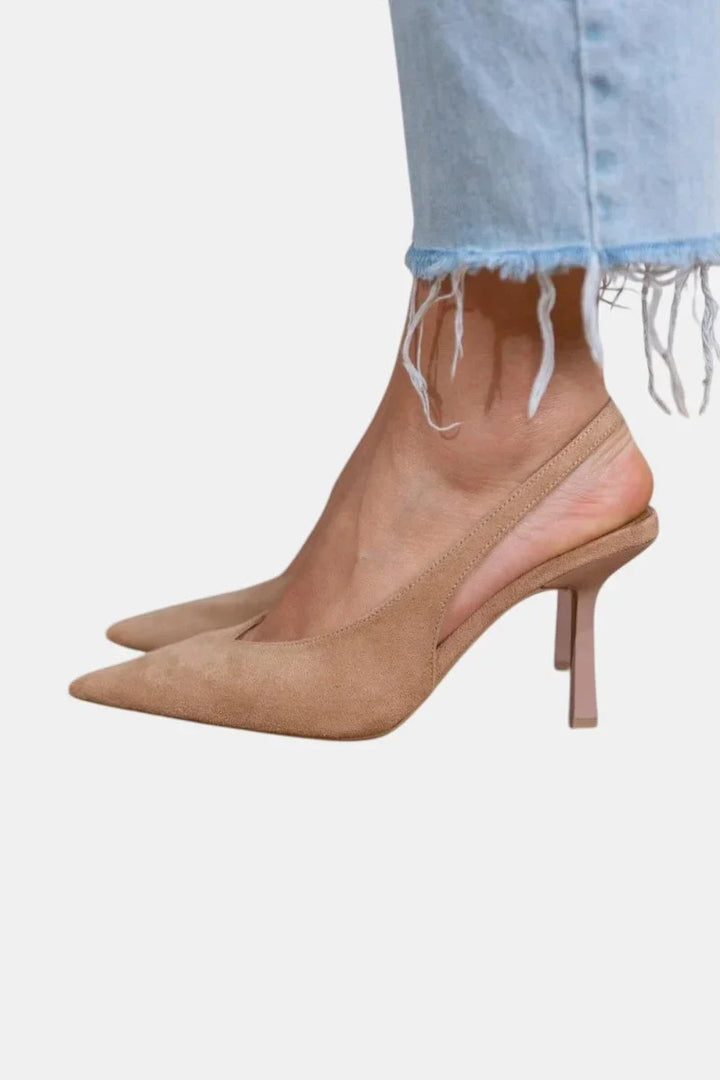 Elegant women's tan pointed-toe slingback stiletto pumps, perfect for formal and office wear.