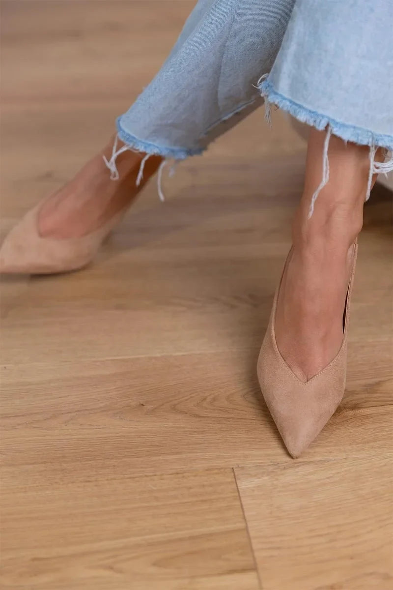 Versatile tan pointed-toe slingback stiletto pumps, a chic choice for women's elegant formal footwear.