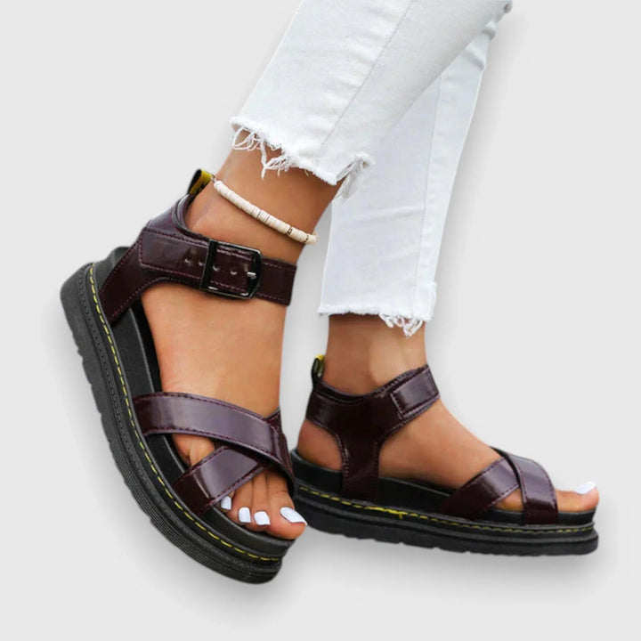 Teal platform sandals for women with comfortable adjustable criss-cross straps, great for fashion & everyday wear.