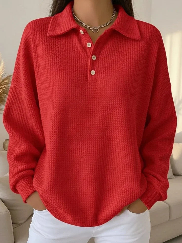 Women's textured polo sweater with long sleeves & button placket, perfect for smart casual everyday style.