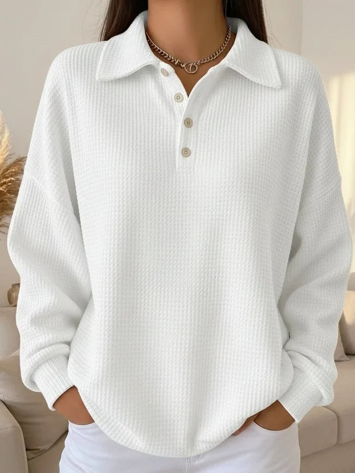 Stylish women's textured knit polo sweater, versatile long sleeve top for casual or smart-casual fashion.