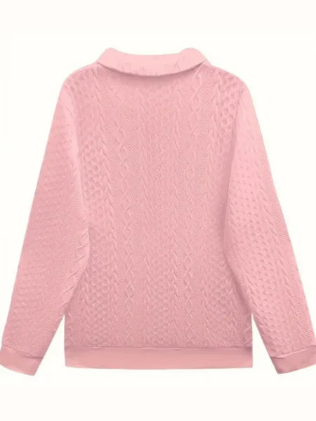Women's slim-fit textured knit quarter-zip sweater. Long sleeves, a stylish & warm choice for winter.