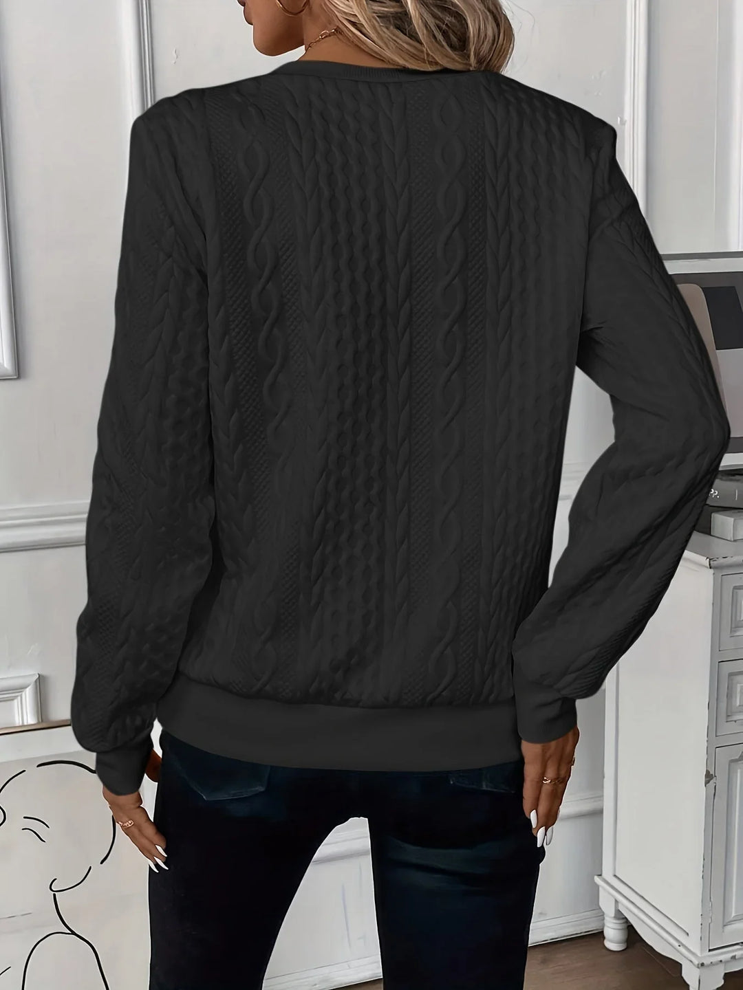 Women's long sleeve textured knit sweater. Quarter-zip design for a cozy, chic winter fashion statement.