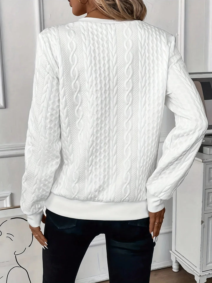 Women's slim-fit textured knit quarter-zip sweater, long sleeve. Cozy & stylish for cold weather.