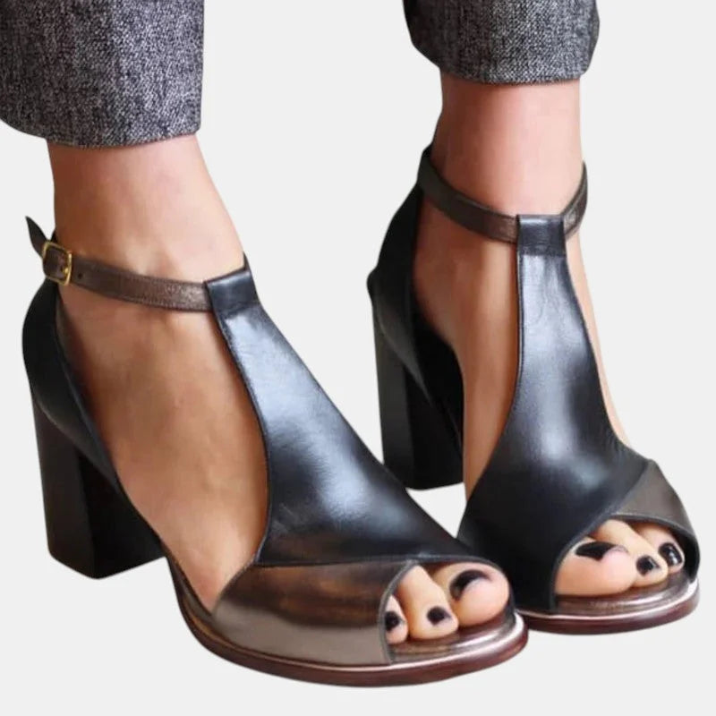 Elegant women's two-tone peep-toe sandals with a stylish T-strap and comfortable block heel, perfect for summer office wear.