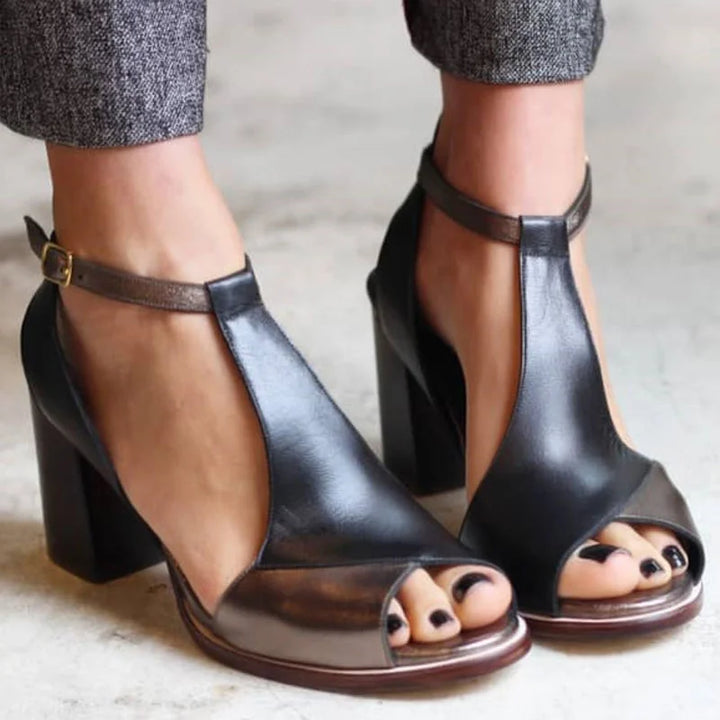 Stylish women's peep-toe sandals featuring a unique two-tone design, T-strap, and sturdy block heel for versatile fashion.