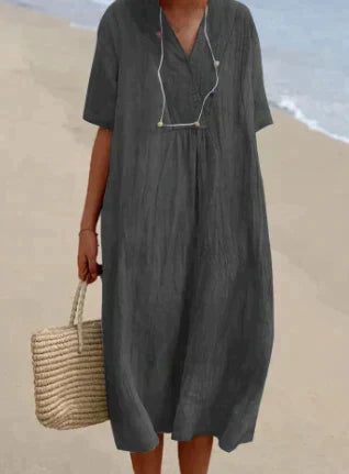 Women's V-Neck Relaxed Midi Dress in light, breathable fabric, featuring a flattering silhouette and perfect for warm weather