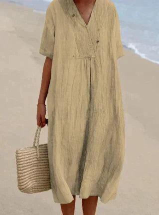 Women's V-Neck Relaxed Midi Dress in light, breathable fabric, featuring a flattering silhouette and perfect for warm weather