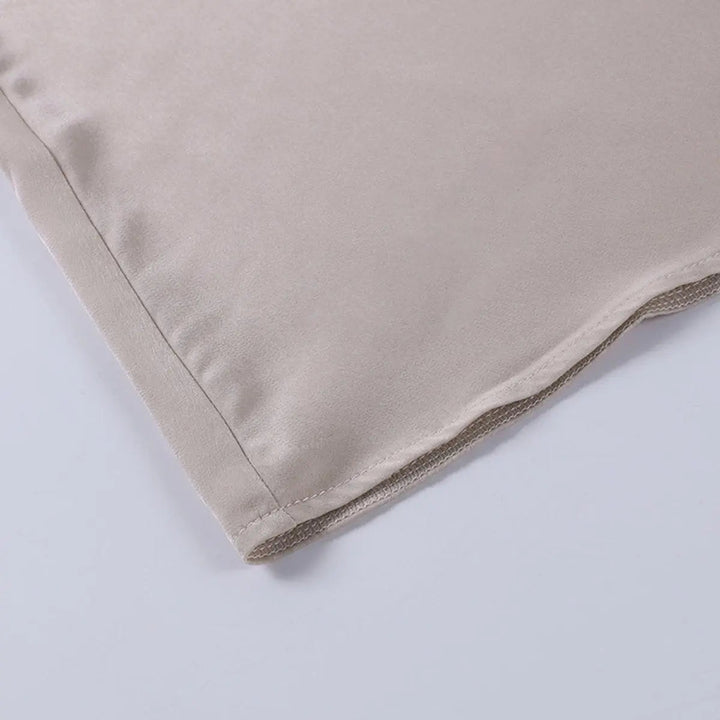 Modern V-neck spaghetti strap evening dress with a high thigh slit, perfect for a memorable formal look.