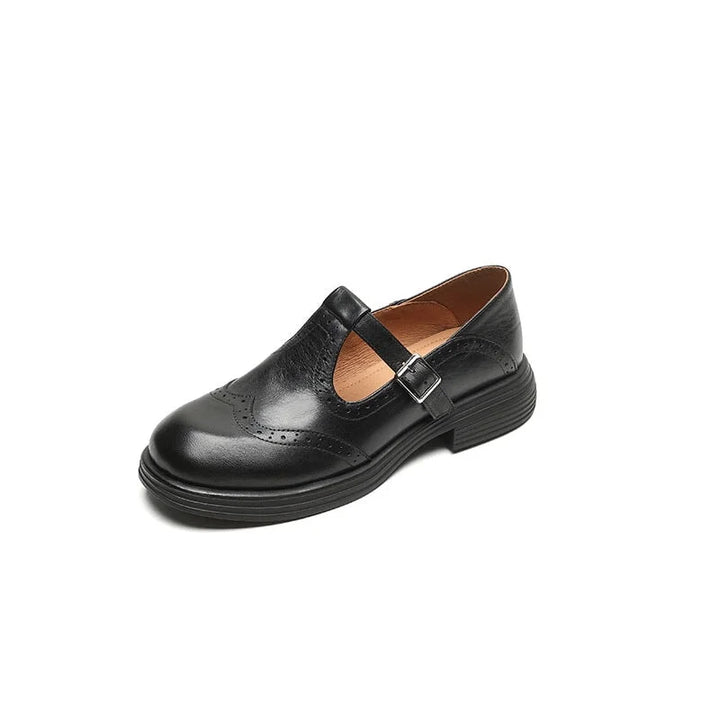 Women's comfortable Mary Jane flat sandals with brogue details and secure, stylish buckle strap.