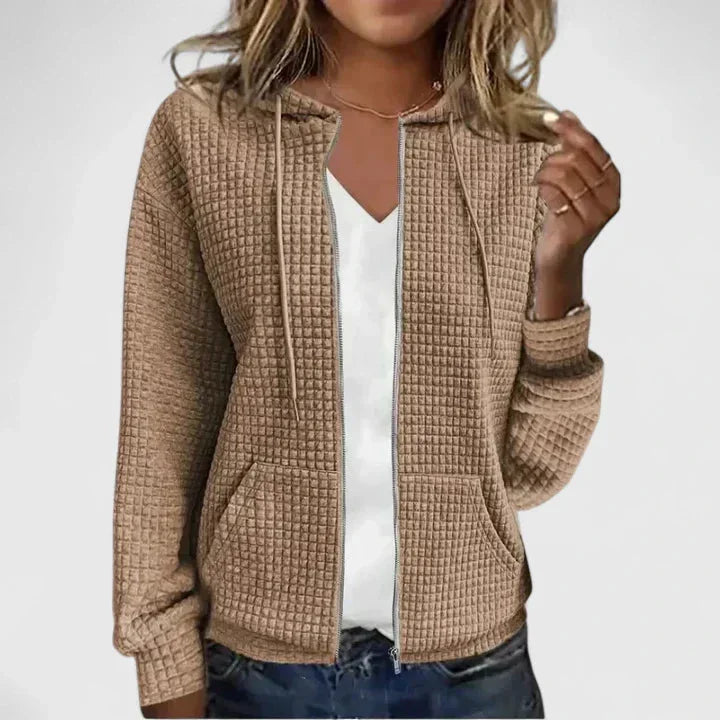 Fall fashion women's waffle-knit hooded cardigan sweater. Full zip & practical pockets for warmth.