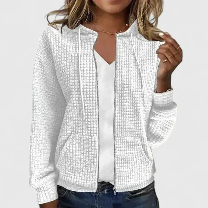 Warm women's hooded full-zip cardigan. Waffle-knit texture, cozy sweater with pockets for everyday wear.
