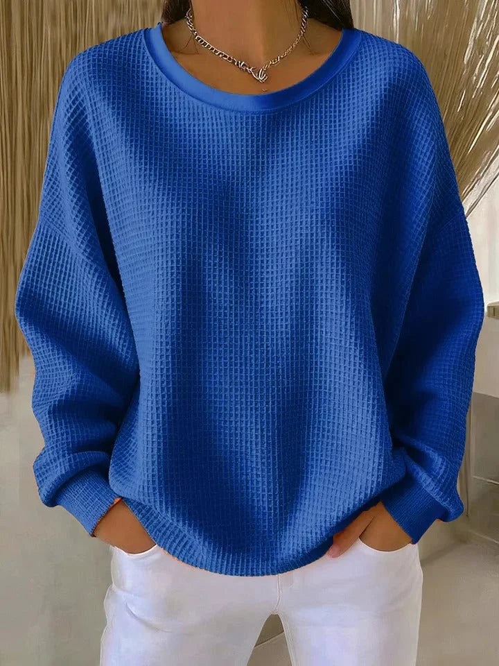 Relaxed fit women's cozy waffle knit sweater, long sleeves, a comfortable pullover.