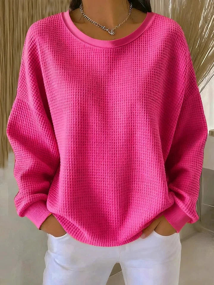 Fall/winter knitwear: cozy, relaxed fit waffle knit sweater with long sleeves for women.
