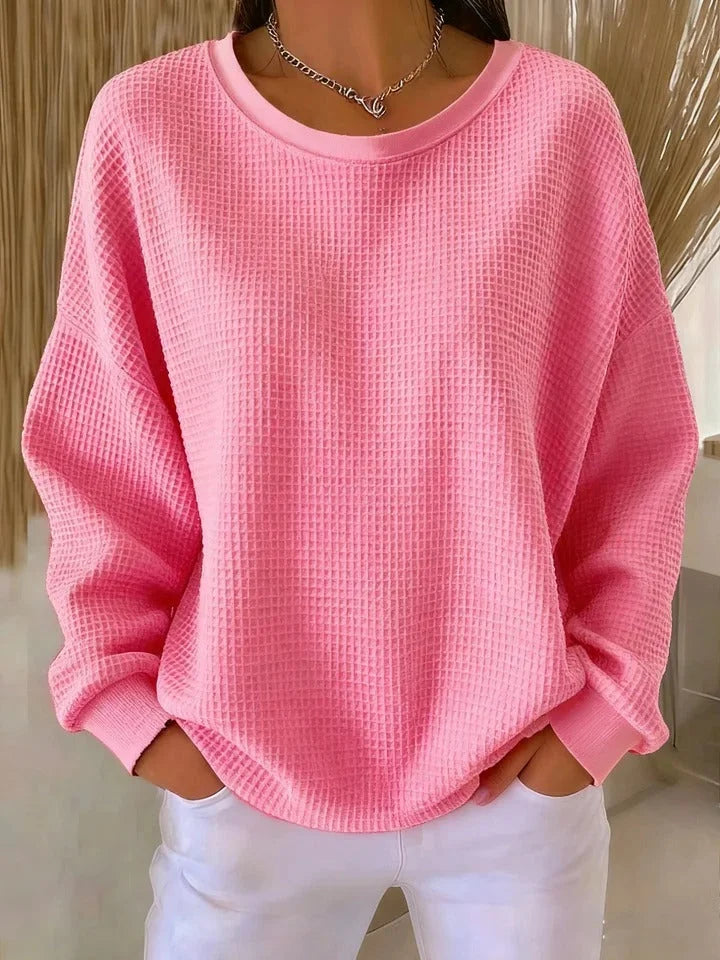 Versatile women's long sleeve waffle knit sweater, relaxed fit, cozy for layering.