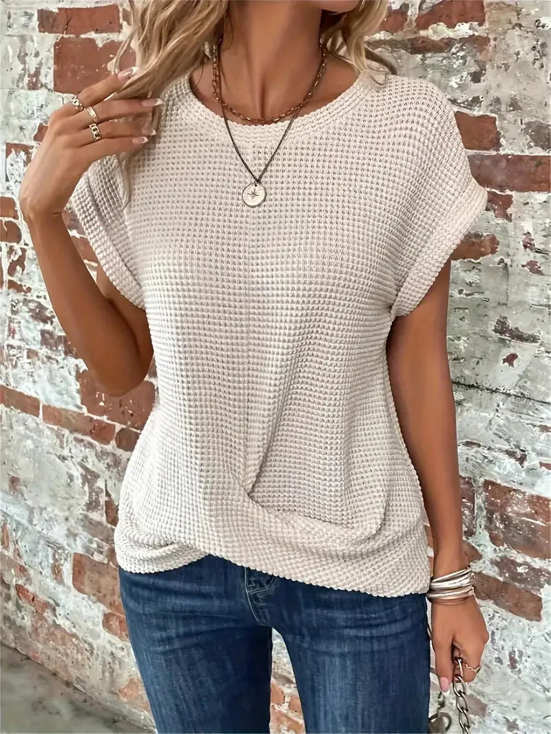 Stylish women's waffle knit short sleeve sweater. Front twist design, ideal for comfortable daily wear.