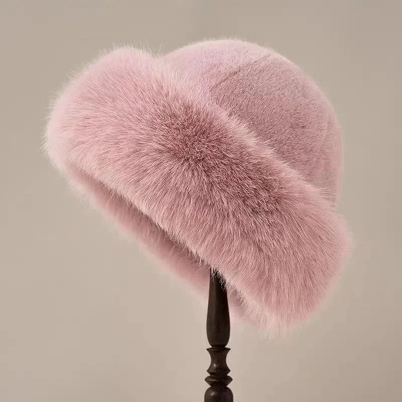 Ladies' cozy faux fur winter hat, perfect for cold weather fashion; features a wide cuffed brim.