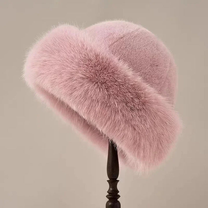 Ladies' cozy faux fur winter hat, perfect for cold weather fashion; features a wide cuffed brim.