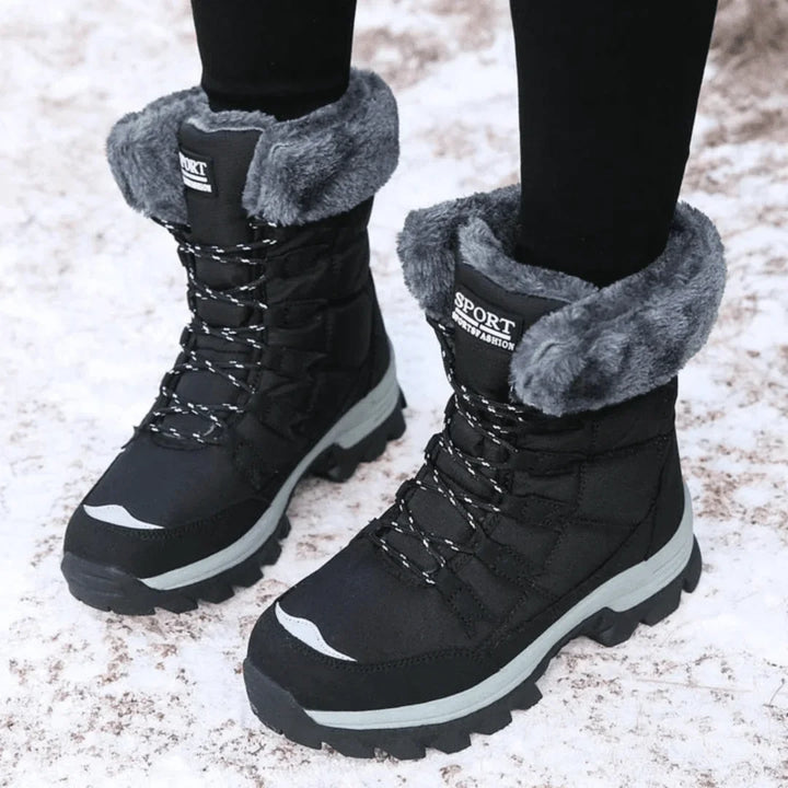 Insulated women's snow boots with cozy quilted design; waterproof for ultimate warmth in winter.