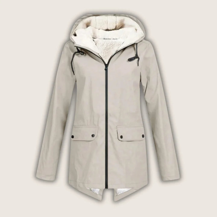 Comfortable women's outdoor jacket. Waterproof and hooded design offers rain protection with convenient front pockets.