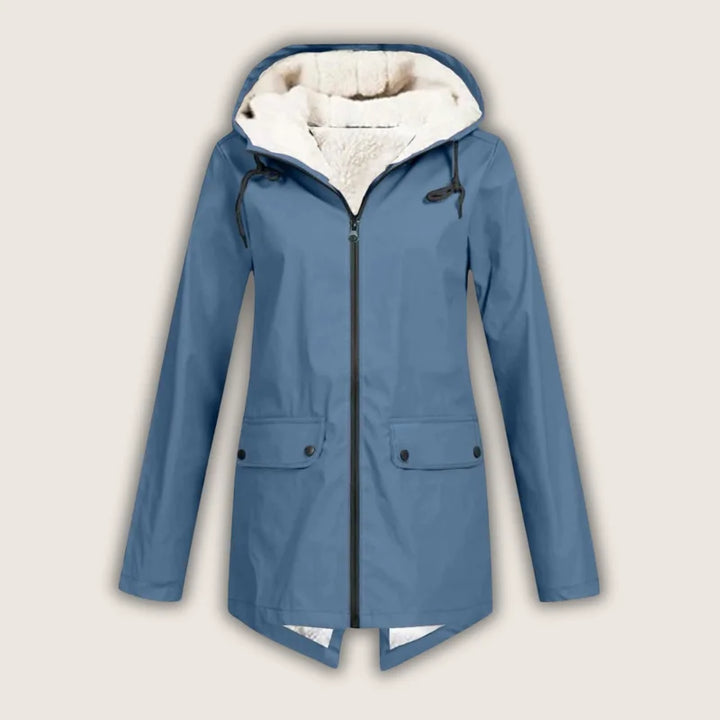 Active women's waterproof hooded jacket. Offers essential rain protection, comfort, and style with convenient front pockets.