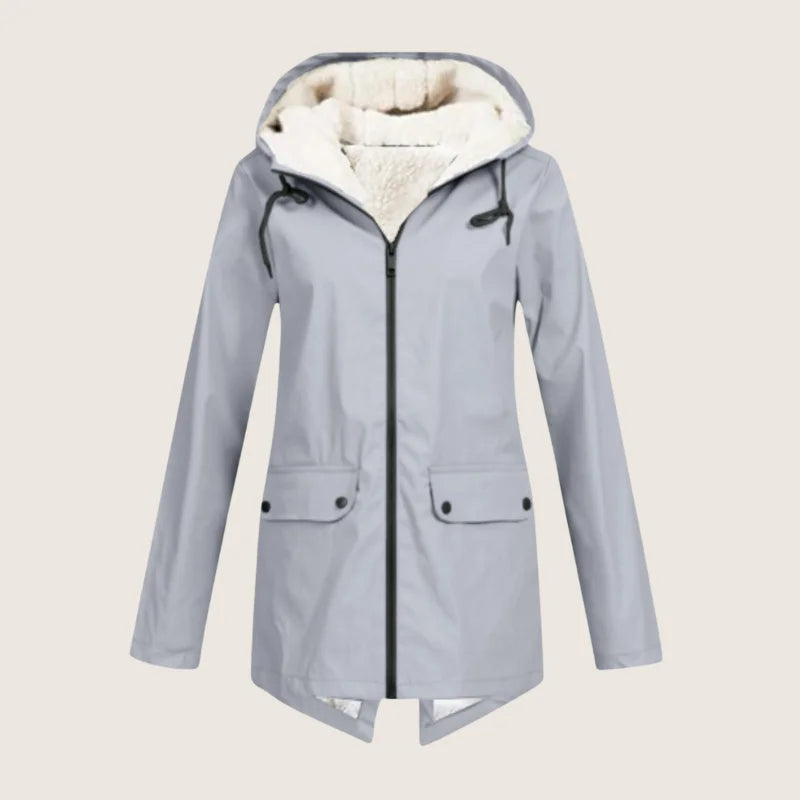 Stylish women's weather-resistant jacket. Hooded, waterproof, and comfortable outerwear with front pockets for women.
