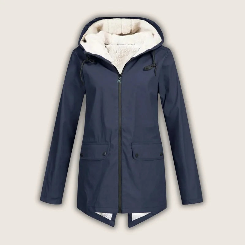 Versatile women's waterproof jacket. Hooded for rain, with practical front pockets for everyday and outdoor wear.