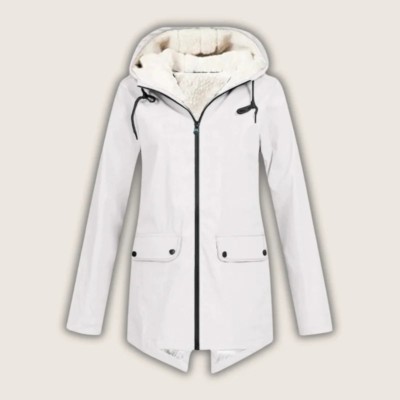 Women's comfortable, waterproof, and hooded jacket featuring convenient front pockets. Ideal stylish outerwear for rain.